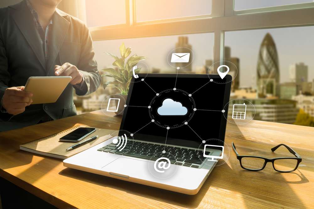 Cloud computing to desk_shutterstock_584787934