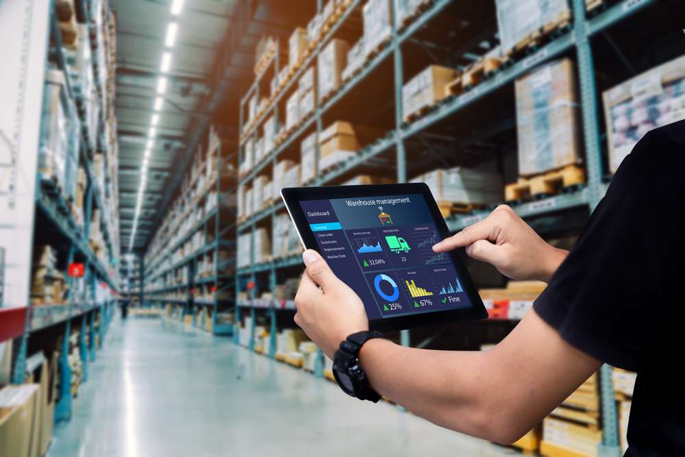 Smart,Warehouse,Management,System.worker,Hands,Holding,Tablet,On,Blurred,Warehouse