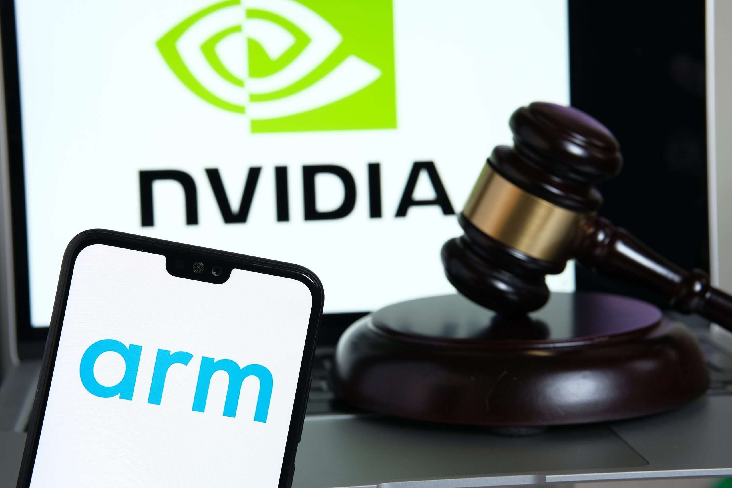 Arm,Company,Logo,Seen,On,The,Smartphone,,Gavel,And,Nvidia