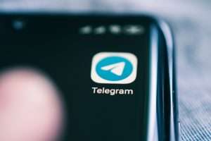 Telegram,Application,Icon,On,Smartphone,Screen,Close-up.,Telegram,App,Icon